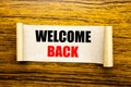 Hand writing text caption inspiration showing Welcome Back. Business concept for Emotion Greeting written on sticky note paper on Royalty Free Stock Photo