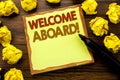 Hand writing text caption showing Welcome Aboard. Business concept for Greeting Join Member Written on sticky note paper, wooden b Royalty Free Stock Photo