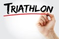 Hand writing Triathlon with marker