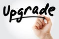 Hand writing Upgrade with marker Royalty Free Stock Photo