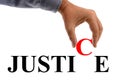Hand writing the word justice on white background Royalty Free Stock Photo