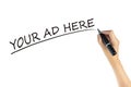 Hand writing word Your Ad Here with black color marker pen isolated on white background. space of advertising for marketing