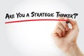 Hand writing Are You a Strategic Thinker? with marker, concept background