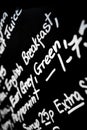 Hand written chalk menu board featured the word Breakfast prominently