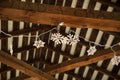 Hand Written Couple Names on Wood Beams with Fairy Lights