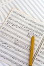 Hand written music score and pencil Royalty Free Stock Photo