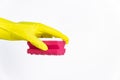 Hand with yellow glove holding red sponge for cleaning on white background Royalty Free Stock Photo