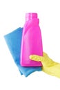 Hand in yellow glove holds pink bottle of liquid detergent and blue rag for duston white background. cleaning Royalty Free Stock Photo