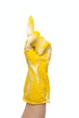 Hand in yellow glove