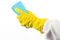 Hand in yellow glove with sponge, Royalty Free Stock Photo