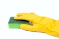 Hand in yellow glove with sponge Royalty Free Stock Photo