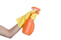 Hand in yellow protective glove spraying cleaning liquid Royalty Free Stock Photo