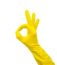 Hand in a yellow rubber glove shows the gesture & x22;okay& x22; isolated on a white background Royalty Free Stock Photo