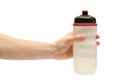 Hand of young girl holding sport water bottle. Royalty Free Stock Photo