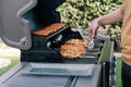 Closeup of grilled shashliks and meat skewers on grate. Royalty Free Stock Photo