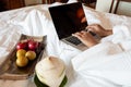 The hand of Young woman Sit play laptop In a luxurious room Ready Fruit Royalty Free Stock Photo