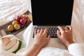 The hand of Young woman Sit play laptop In a luxurious room Ready Fruit Royalty Free Stock Photo