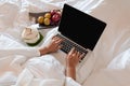 The hand of Young woman Sit play laptop In a luxurious room Ready Fruit Royalty Free Stock Photo