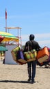 handbag seller in tourist resort beach