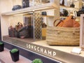 Longchamp brand handbags in window display Boutique Germany