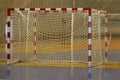 Handball goal in a sports hall with various lines