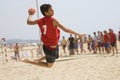 Handball player jumping with the ball Royalty Free Stock Photo