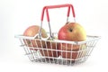 Handbasket with apples on white background Royalty Free Stock Photo