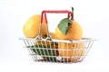 Handbasket with tangerines on white background Royalty Free Stock Photo