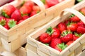 Handcrafted baskets with fresh strawberries.