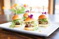 handcrafted beef sliders with microgreens on top Royalty Free Stock Photo