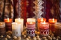 handcrafted candles arranged in a bohemian pattern