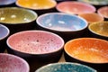 Handcrafted Ceramic bowl with colorful powder. Generate Ai