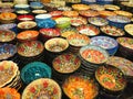 Handcrafted colorful decorated plates shot at the market