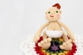 HandCrafted Crochet Baby Doll On Colorful Blanket Royalty Free Stock Photo