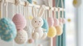 Handcrafted crochet bunny with colorful easter eggs in soft pastels Royalty Free Stock Photo