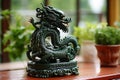 Handcrafted Green Wooden Dragon. Symbol of Prosperity and Fortune for the New Year