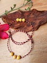 Handcrafted jasil bracelet with 3 Balinese colored threads