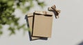 Handcrafted kraft paper gift package with natural greenery and subtle sunlight shadow title should presenting main subject. no Royalty Free Stock Photo