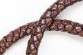 Handcrafted leather rope on white background