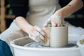 Handcrafted on a potter`s wheel,Hands make clay from various items for home and sale in the store and at the exhibition Royalty Free Stock Photo