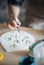 Handcrafted on a potter`s wheel,Hands make clay from various items for home and sale in the store and at the exhibition Royalty Free Stock Photo