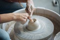 Handcrafted on a potter`s wheel,Hands make clay from various items for home and sale in the store and at the exhibition, ceramic i Royalty Free Stock Photo