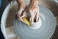 Handcrafted on a potter`s wheel,Hands make clay from various items for home and sale in the store and at the exhibition, ceramic i Royalty Free Stock Photo