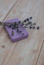 Handcrafted purple lavender soap with lavender flowers. Natural hydrating moisturiser softness cosmetic. Organic calming