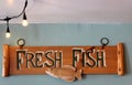 Handcrafted sign on painted walls inside seafood restaurant, Eddie F`s Eatery, Saratoga, New York, 2019, 2019