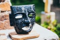 Souvenir aztec mask made out of obsidian