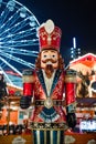 Handcrafted wood Nutcracker toy Christmas Market in Katowice, Poland. Festive nutcracker soldier toys in the evening Royalty Free Stock Photo