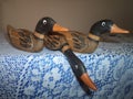 Handcrafted wooden ducks