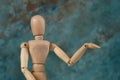 Handcrafted wooden man figure mannequin model dummy doll on background. Copy space Royalty Free Stock Photo