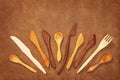 Handcrafted wooden utensils on leather background Royalty Free Stock Photo